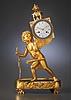 An extremely fine Empire gilt bronze mantle clock ‘à la lanterne magique’ of eight day duration, the white enamel dial signed L. Grognot à Paris 
